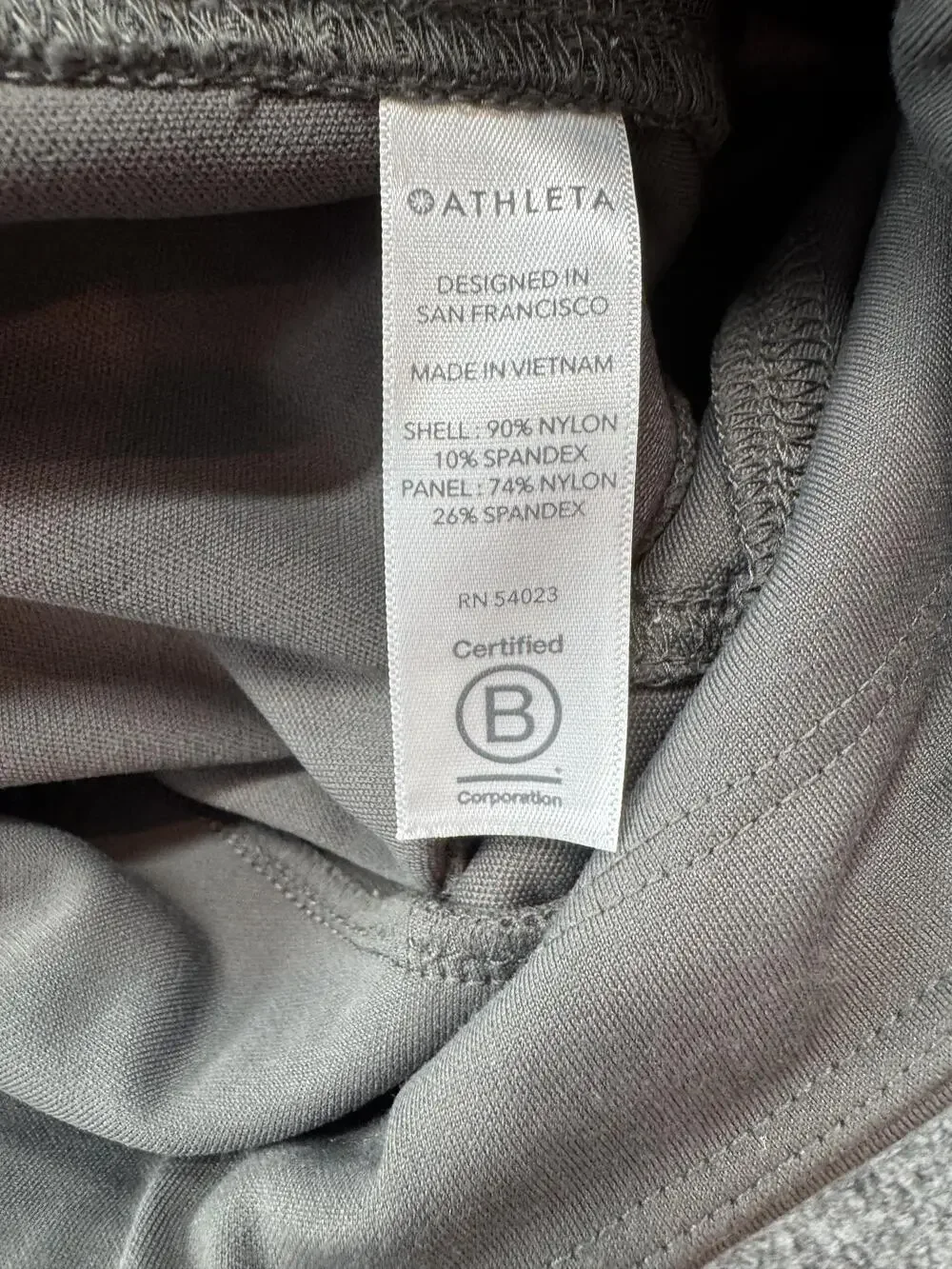 Athleta Headlands Hybrid Moto Tight Leggings Womens 4 Green Ankle Zip Pockets